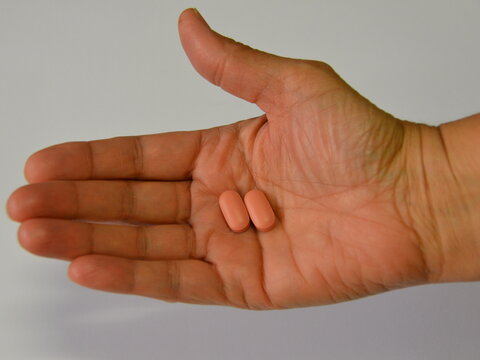 single-dose tafenoquine 150mg tablets in palm of hand