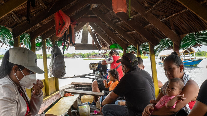 healthworkers in a boat, Peru